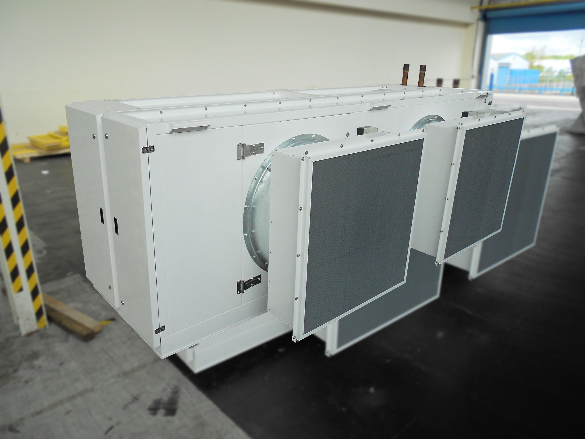 Bespoke ceiling mounted industrial air cooler with twin fan section and coil assemblies
