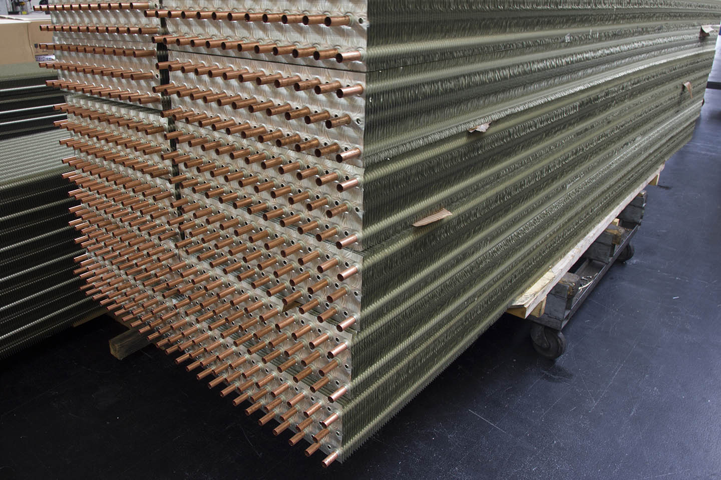 Large copper tube and polycoated aluminium fin coil block ready for assembly