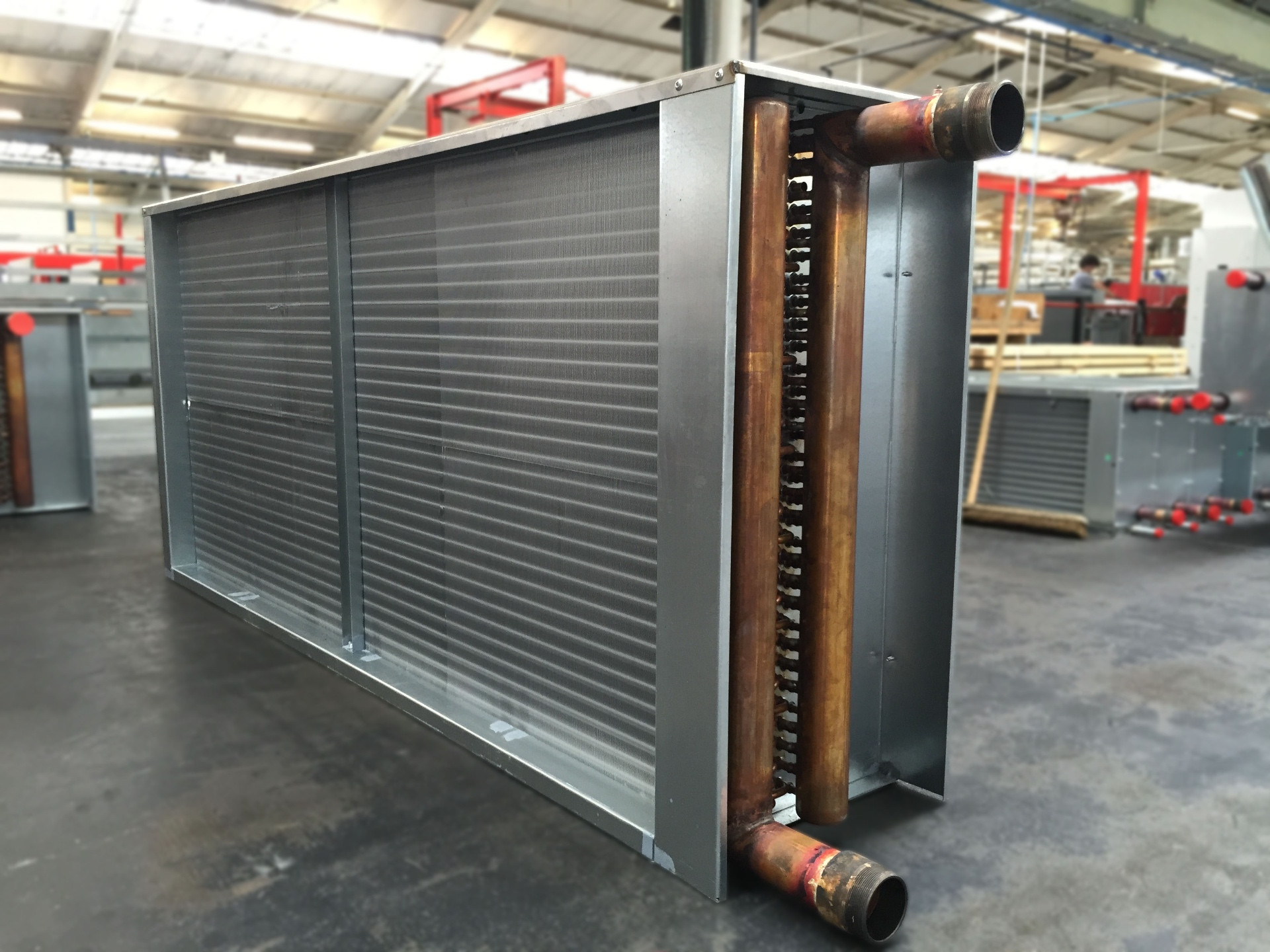 Bespoke chilled water coil with copper headers and aluminium fin block