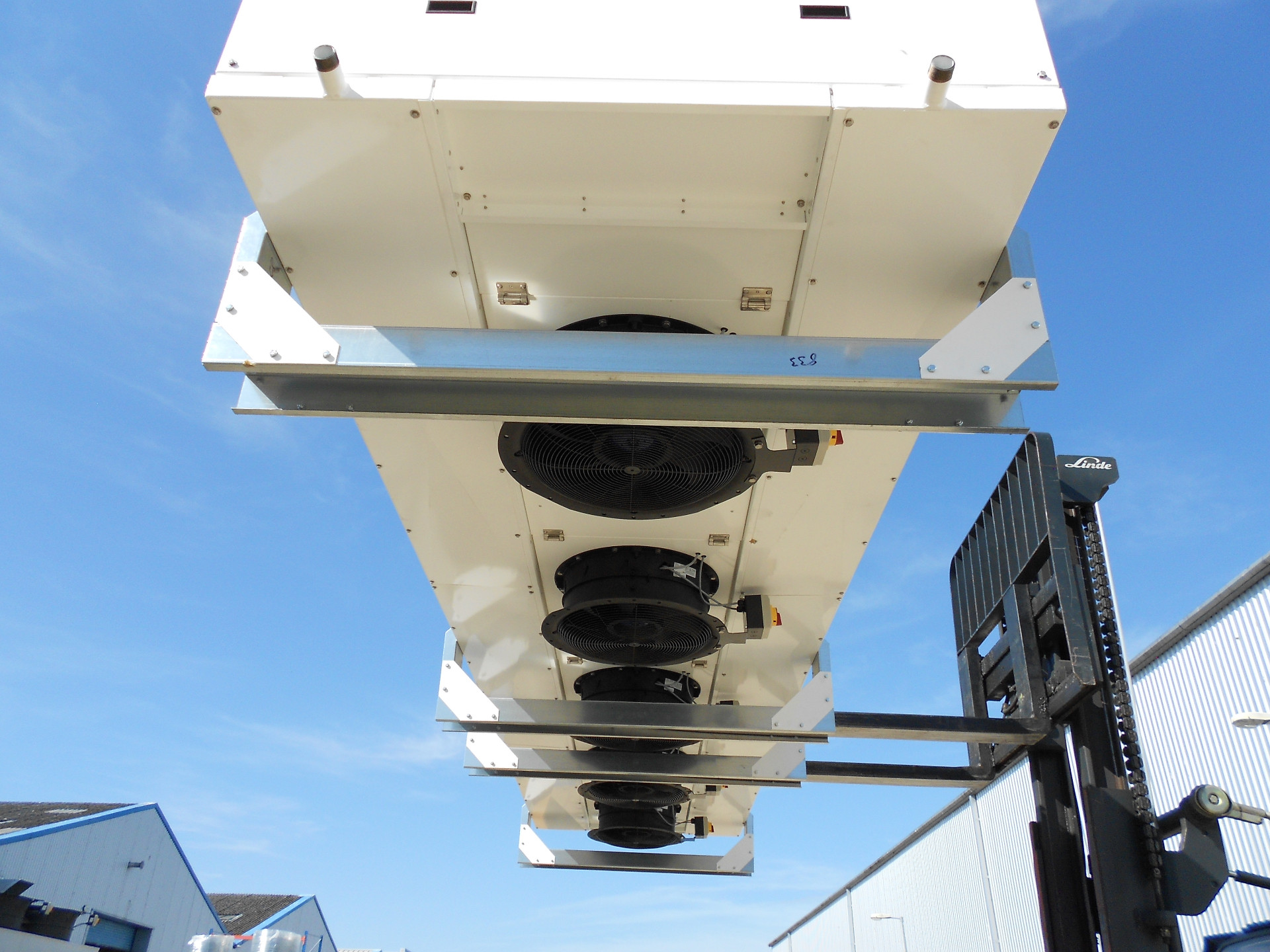 Underside view of a dual discharge cooler showing multiple EC fans