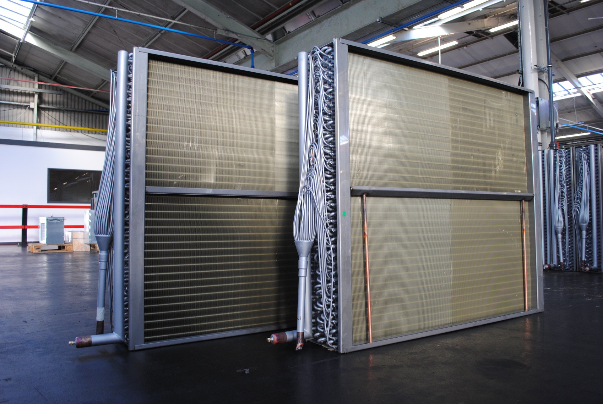 Large bespoke DX coils with stainless casings and copper return bends in the HC Coils workshop