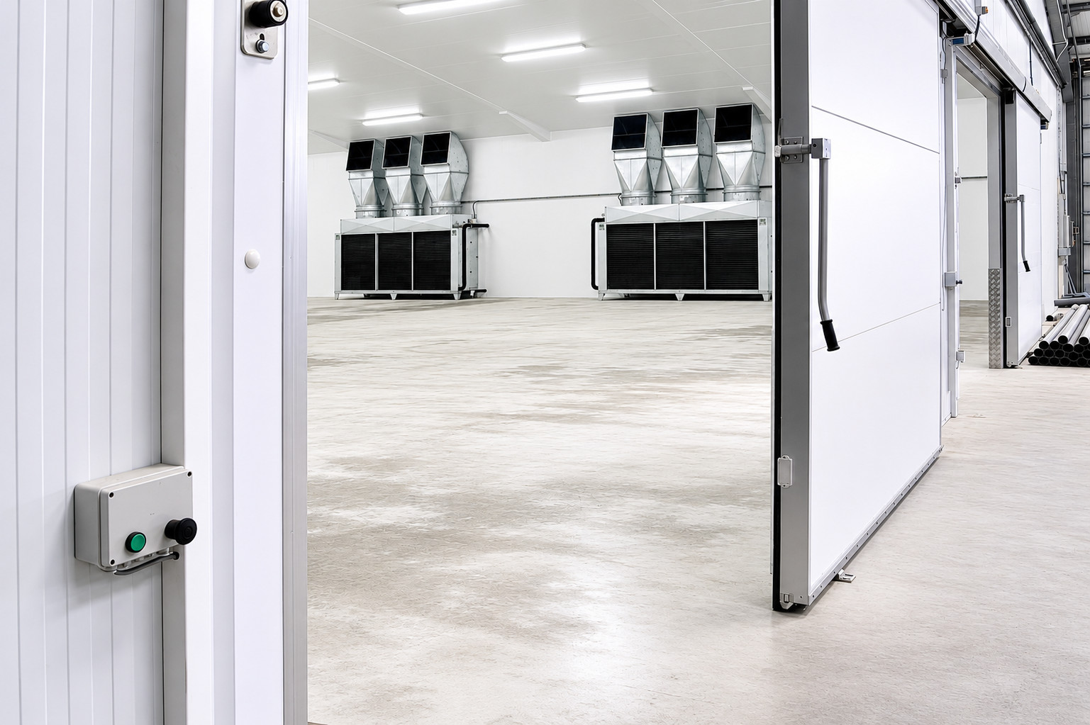 Floor mounted coolers installed inside an industrial cold storage facility