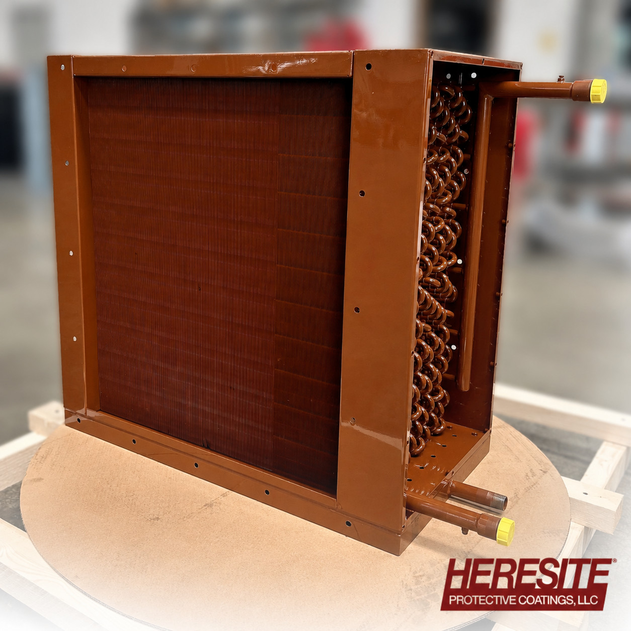 Heresite-coated copper coil with protective phenolic finish for corrosive environments