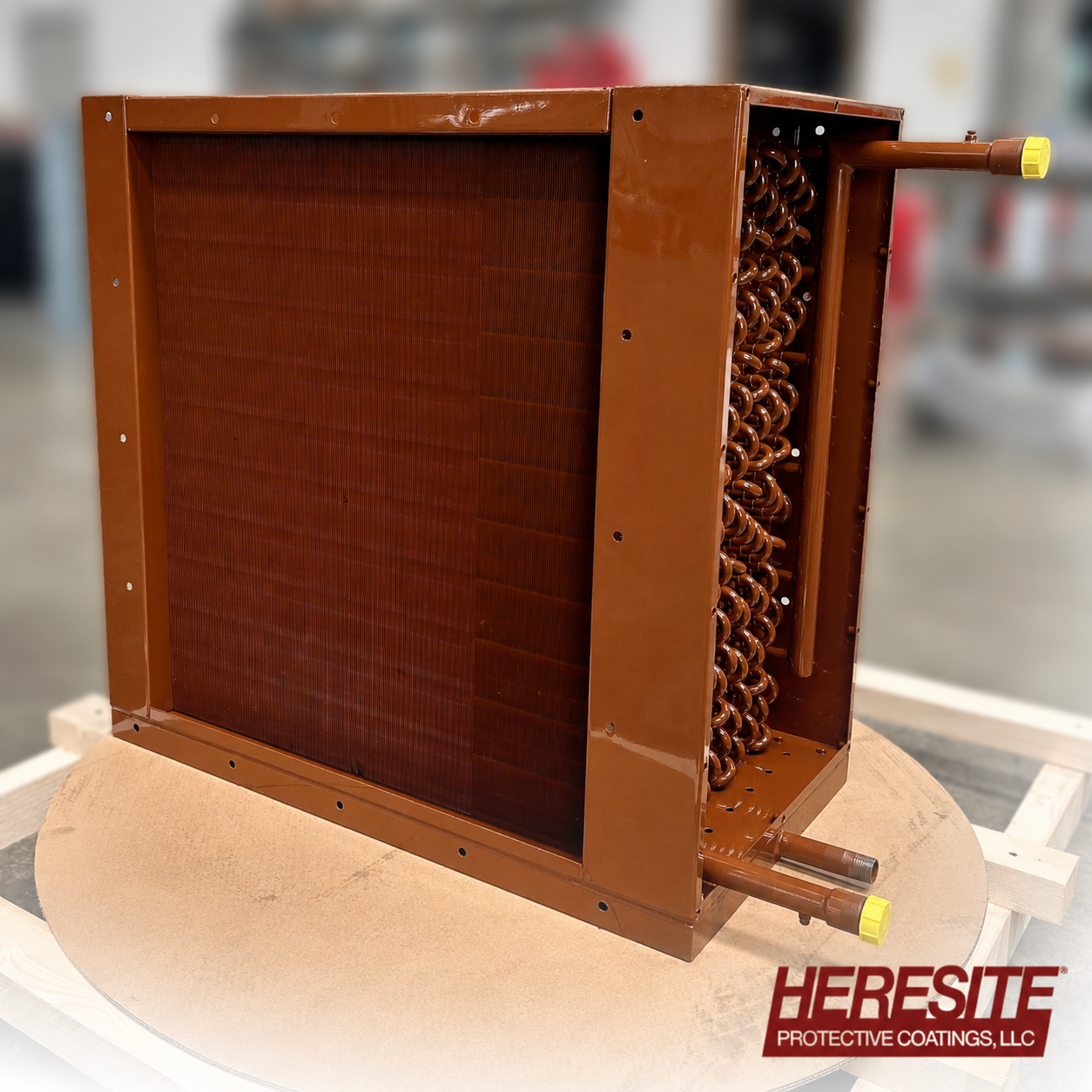 Heresite-coated copper coil with protective phenolic finish for corrosive environments