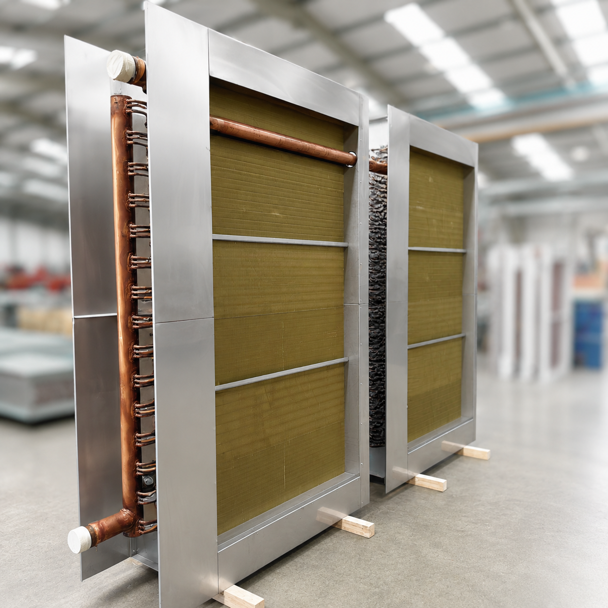 Large bespoke hot water heating coils with copper return bends ready for despatch
