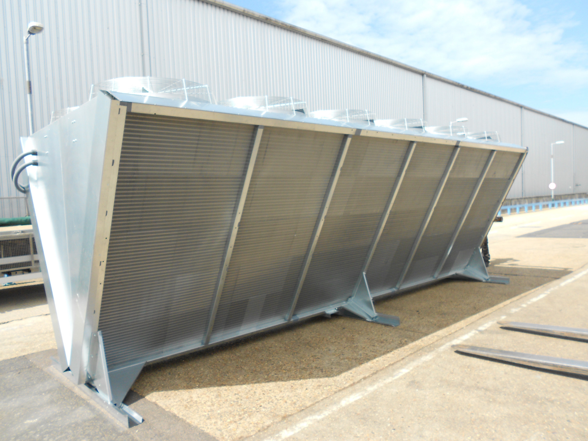 V-configuration dry cooler installed on site with top-mounted fans